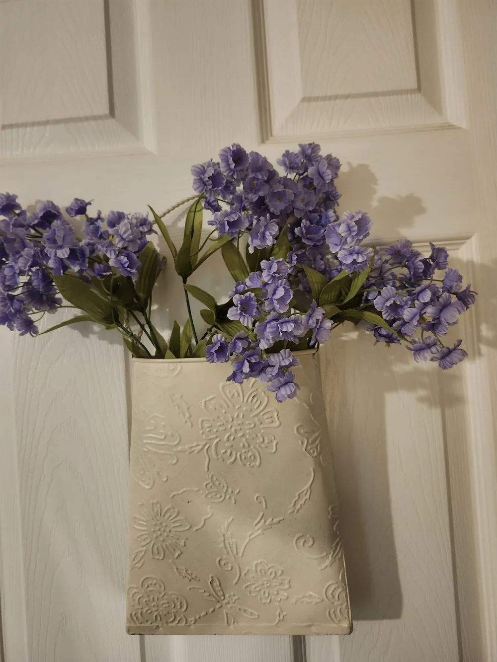 Cream Embossed Floral Wall Vase with Purple Artificial Flowers